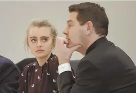  ?? STAFF PHOTO BY FAITH NINIVAGGI ?? THREE-MONTH BREAK: Michelle Carter appears in Taunton Juvenile Court yesterday with defense counsel Joseph Cataldo. The judge in the case granted a three-month continuanc­e after much debate.