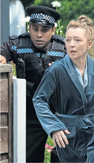  ?? ?? COMMUNITY TENSIONS: Harpal Hayer as PC Arjun Patel and Lesley Manville as