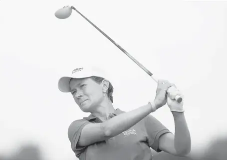  ?? HARRY HOW/GETTY IMAGES ?? Catriona Matthew of Scotland hits a tee shot on the 10th hole during round two of the Manulife Financial LPGA Classic Friday in Waterloo, Ont.