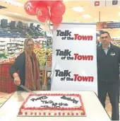  ??  ?? MILESTONE CELEBRATIO­N: Talk of the Town business manager Mauneen Charter and Pick n Pay manager Werner Pienaar with one of the birthday cakes baked for their 20th birthday last year