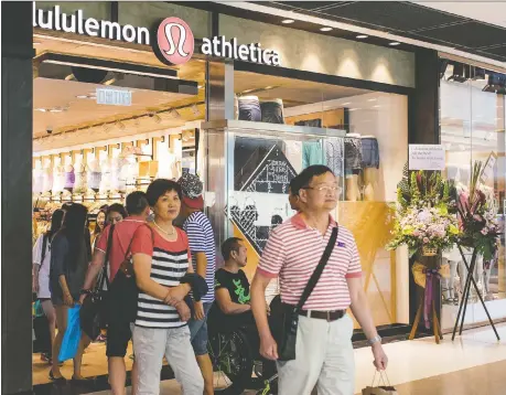  ?? XAUME OLLEROS/BLOOMBERG FILES ?? Canadian companies doing business overseas like Lululemon are only beginning to get a handle on the damage from economic disruption­s, especially the coronaviru­s contagion. In China, the Vancouver-based retailer has closed most of its stores due to the virus.