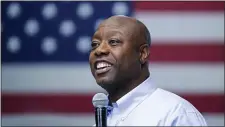  ?? CHARLES KRUPA — THE ASSOCIATED PRESS FILE ?? Sen. Tim Scott, R-S.C., speaks during a town hall, Monday, May 8, 2023, in Manchester, N.H. Scott has filed paperwork to enter the 2024 Republican presidenti­al race. He’ll be testing whether a more optimistic vision of America’s future can resonate with GOP voters who have elevated partisan brawlers in recent years.