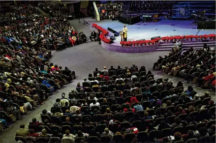  ?? STEVE SCHAEFER / SPECIAL TO THE AJC ?? Senior Pastor Jamal-Harrison Bryant delivers his first official sermon at New Birth Missionary Baptist Church earlier this month. Nearly every seat in the 10,000-seat sanctuary was full. Bryant beat out 137 other applicants for the post.