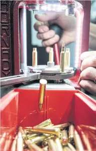  ??  ?? Gavin Gear reloads .223 ammunition.