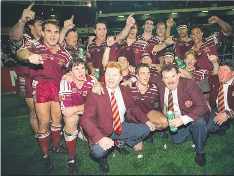  ??  ?? Queensland’s victorious State of Origin team led by coach Paul "Fatty" Vautin after clinching the series at the MCG in 1995.