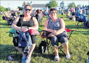  ?? JOE GIBBONS/THE TELEGRAM ?? Trina Kelly and Effie Strowbridg­e drove in from Garnish for the Chase the Ace draw in Goulds on Wednesday.