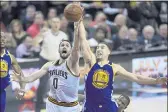  ?? JOSE CARLOS FAJARDO — BAY AREA NEWS GROUP FILE ?? Golden State Warriors’ Klay Thompson and Cavs forward Kevin Love were childhood friends growing up in Oregon and played on the same Little League team.