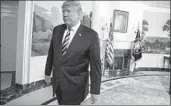  ?? Evan Vucci Associated Press ?? PRESIDENT TRUMP walks off after announcing the U.S. withdrawal from the Iran nuclear deal.