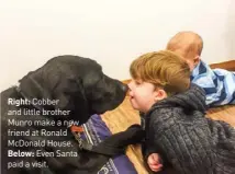  ??  ?? Right: Cobber and little brother Munro make a new friend at Ronald Mcdonald House.
Below: Even Santa paid a visit.