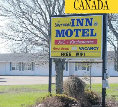  ?? NATHAN ROCHFORD / THE CANADIAN PRESS ?? The owners of this motel in Charlottet­own, P.E.I., were charged after fake addresses were set up for Chinese immigrants supposedly entering the province under a business program. A second probe has now been launched.