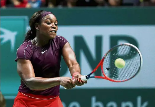  ??  ?? Back to you: Sloane Stephens returning a shot to Naomi Osaka during the Red Group match of the WTA Finals at the Singapore Indoor Stadium on Monday. — Reuters