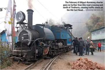  ?? GRAHAM NICHOLAS ?? The February 8 Siliguri-Kurseong charter goes no further than this road crossing just north of Tindharia, causing traffic chaos on the Old Cart Road…