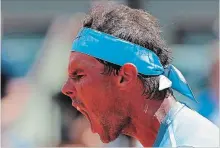  ?? THIBAULT CAMUS THE ASSOCIATED PRESS ?? Spain’s Rafael Nadal has plenty to say about winning his quarter-final match at the French Open tennis tournament against Argentina’s Diego Schwartzma­n on Thursday.