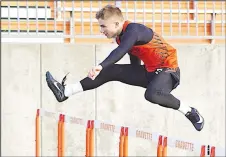  ?? Randy Moll/Westside Eagle Observer ?? Gravette sophomore Kelton McDougal competes in the 300-meter hurdles on Friday at the Gravette Running Festival. He finished fifth in the event.