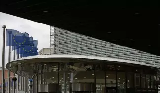  ?? ?? European Union flags flap in the wind outside EU headquarte­rs in Brussels, Friday, April 5, 2024.