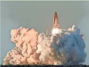  ?? GETTY IMAGES ?? The space shuttle Atlantis blasts off for the internatio­nal space station on June 8, 2007, from Kennedy Space Center.