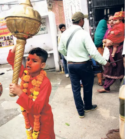  ?? ?? PLAYING HANUMAN with a heavy mace while dancing to the beat.