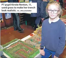  ?? 50_c49castleh­ill02 ?? P7 pupil Kirstie Renton, 11, used grass to make her trench look realistic.