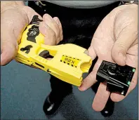  ?? Arkansas Democrat- Gazette fi le photo ?? The Little Rock Board of Directorsa­pproved the purchase of 31 new Tasers for the Little Rock Police Department during its Tuesday meeting.