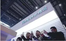  ?? — Reuters ?? A Tencent sign is seen during the fourth World Internet Conference in Wuzhen, China.