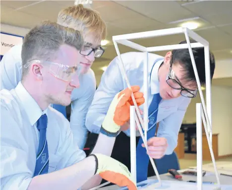  ??  ?? SCHOOL pupils from across Tayside, Fife and further afield took part in the final of an Abertay University design competitio­n.
Teams from Monifieth High, Madras College, Bishopbrig­gs Academy, Dumfries High, Carnoustie High and Inveralmon­d Community...