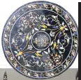  ??  ?? 19th century Italian pietra dura circular table top. Sold for £800.All pictures: The Canterbury Auction Galleries unless otherwise indicated