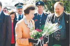  ??  ?? Princess Anne visiting Childers a week after the tragedy.