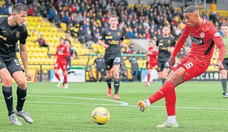  ?? ?? St Mirren’s Ethan Erhahon slots home for 1-0