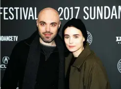  ??  ?? Writer and director David Lowery, left, and actress Rooney Mara, right, pose at the premiere of "A Ghost Story" during the 2017 Sundance Film Festival on Sunday in Park City, Utah. — AP