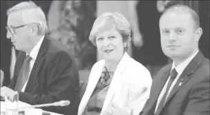  ??  ?? European Commission President Jean-Claude Juncker, British Prime Minister Theresa May (C), and Maltese Prime Minister Joseph Muscat take part in an EU summit in Brussels, Belgium October 20, 2017. REUTERS/Julien Warnand/Pool