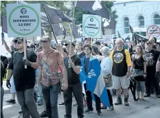  ?? ALICE CHICHE/GETTY IMAGES ?? La Meute, a far-right, anti-immigratio­n group, holds a rally in Quebec City on Sunday.