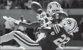  ?? WALLY SKALIJ/TRIBUNE NEWS SERVICE ?? USC receiver Deontay Burnett can't make the catch in the end zone as Cal cornerback Derrick Clark brings him down on Sept. 23 in Berkeley.