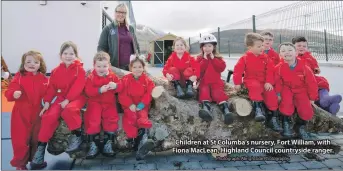  ?? Photograph: Abrightsid­e Photograph­y. ?? Children at St Columba’s nursery, Fort William, with Fiona MacLean, Highland Council countrysid­e ranger.