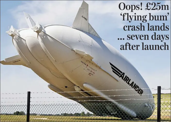  ??  ?? Rock bottom: The 302ft-long Airlander 10, known as the ‘flying bum’ for its distinctiv­e behind, slowly crashes nose-first into the ground yesterday, to the horror of plane spotters