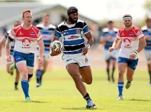  ?? PHOTO: GETTY IMAGES ?? Wanganui centre Kaveni Dabenaise breaks away for a try during the Meads Cup final against Horowhenua Kapiti at Levin Domain.