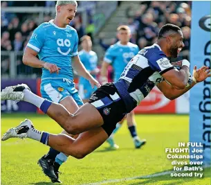  ?? ?? IN FULL FLIGHT: Joe Cokanasiga dives over for Bath’s second try