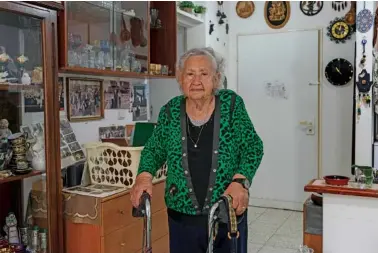  ?? AP PHOTO/TSAFRIR ABAYOV ?? Holocaust survivor Tova Gutstein, 90, who lived in the Warsaw Ghetto as a child, poses April 9 at her apartment in the city of Rishon Lezion, Israel.