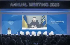  ?? AFP ?? Ukrainian President Volodymyr Zelensky is displayed on a screen via video link during the World Economic Forum (WEF) meeting in Davos, on Wednesday.