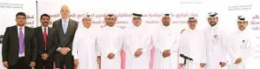  ??  ?? Ashghal president engineer Saad bin Ahmad al-Muhannadi and other officials with representa­tives of the companies concerned at the contracts signing ceremony yesterday.