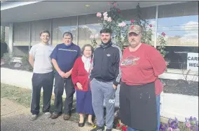  ?? LYRIC AQUINO — THE MORNING JOURNAL ?? Chris’ Restaurant on the Lake staff members Sam Breeding, left, Pepi Danailovsk­i, Dolores Manofski, Phillip Danailovsk­i and Charlie Shreve pose outside the eatery.