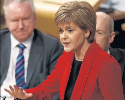  ??  ?? IN FULL FLOW: First Minister Nicola Sturgeon was under fire over the Scottish Government’s failure to update tax forecasts from North Sea oil and gas.