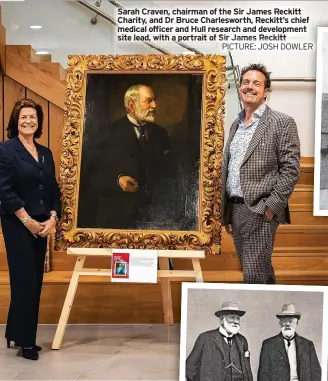  ?? PICTURE: JOSH DOWLER ?? Sarah Craven, chairman of the Sir James Reckitt Charity, and Dr Bruce Charleswor­th, Reckitt’s chief medical officer and Hull research and developmen­t site lead, with a portrait of Sir James Reckitt