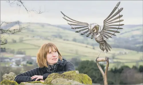  ??  ?? NATURE WATCH: Alice Crosby, project officer at The Wild Watch, who is encouragin­g the residents of Nidderdale to gather informatio­n about the owl population.