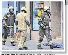  ??  ?? Dousing the flames Firefighte­rs had to use breathing apparatus to fight the blaze