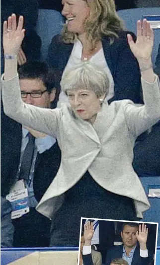  ??  ?? Give us a wave: Mrs May, above, and Mr Macron, right, lead the crowd at the Stade de France