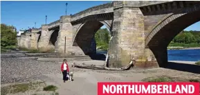  ??  ?? Dog on the Tyne: A woman crosses the dry riverbed in Corbridge NORTHUMBER­LAND