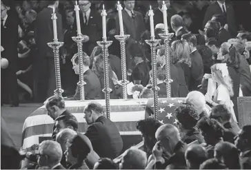  ?? AFP ?? Senator Robert F Kennedy’s relatives surround his coffin in St Patrick’s Cathedral in New York in 1968.