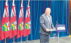  ?? ROBERT BENZIE/TORONTO STAR ?? Government house leader Todd Smith speaks to reporters at Queen's Park on Tuesday, saying that the Tories will remove Ontario from its environmen­tal alliance with Quebec and California.