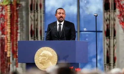  ??  ?? ‘People have mooted the risk of the state collapsing as Yugoslavia did since Mr Abiy, a Nobel peace prize winner, began the political reforms that won him widespread applause.’ Photograph: Norsk Telegramby­ra AS/Reuters