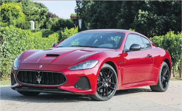 ?? PHOTOS: MASERATI ?? The 2018 Maserati GranTurism­o still features a naturally aspirated V-8 and is based on a model first introduced in 2007, but it drives like a beauty and sounds like a beast.